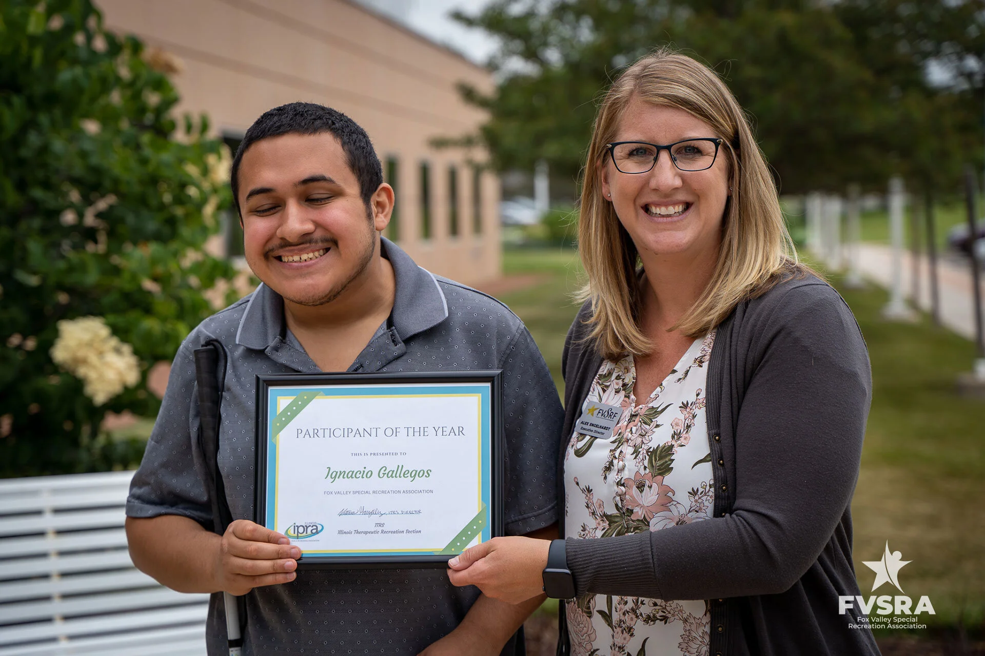 Ignacio Gallegos holding his Participant of the Year certificate beside FVSRA Executive Director Alex Engelhardt